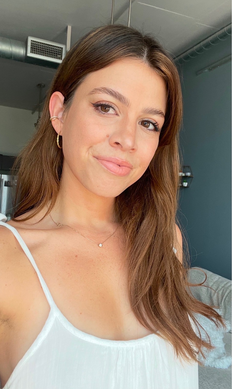 Paula’s actual brunette hair after her color change